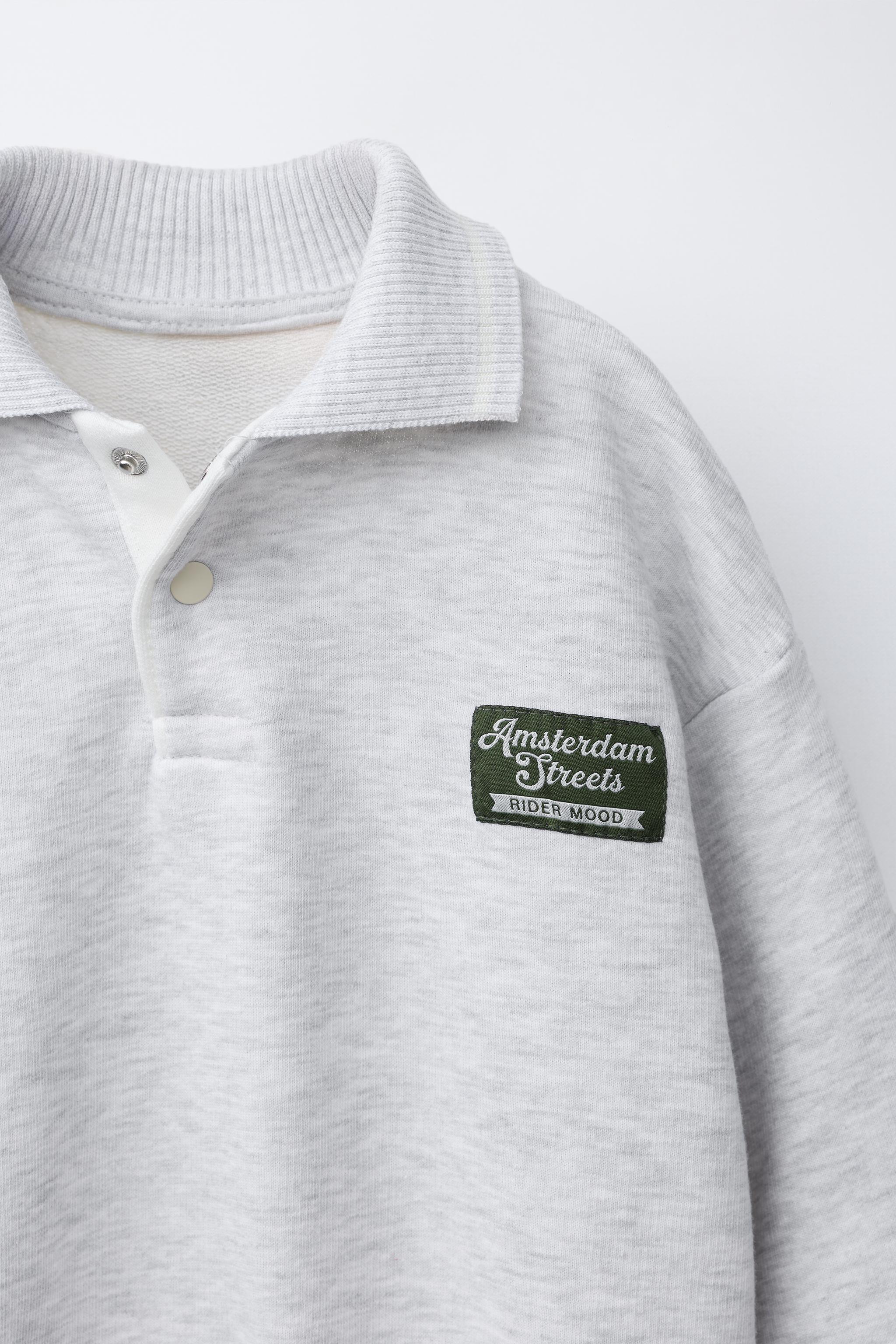 EMBROIDERED LABEL POLO SWEATSHIRT